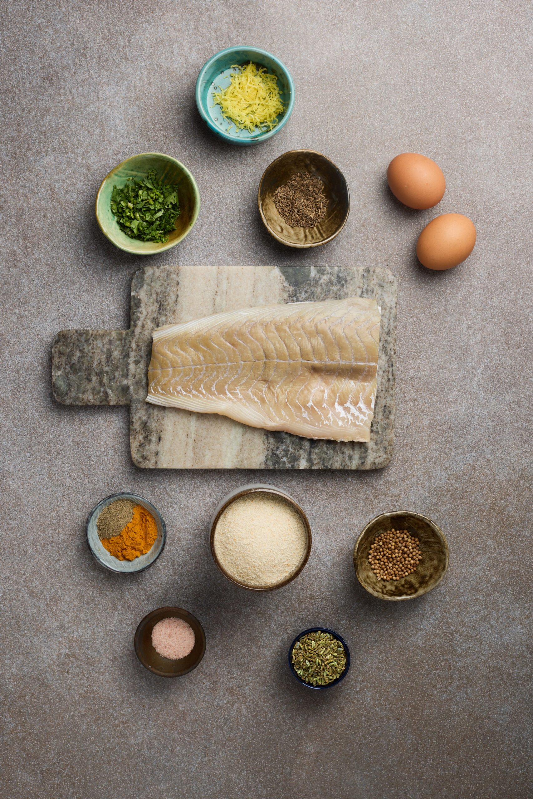 White fish, breadcrumbs, and a handful of warm spices — everything you need for homemade fish fingers