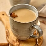 Wagh Bakri Masala Tea Copycat served in a cup with steam rising, showing creamy spiced chai and rich color.