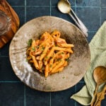 Plate of creamy butter chicken pasta ready to serve.