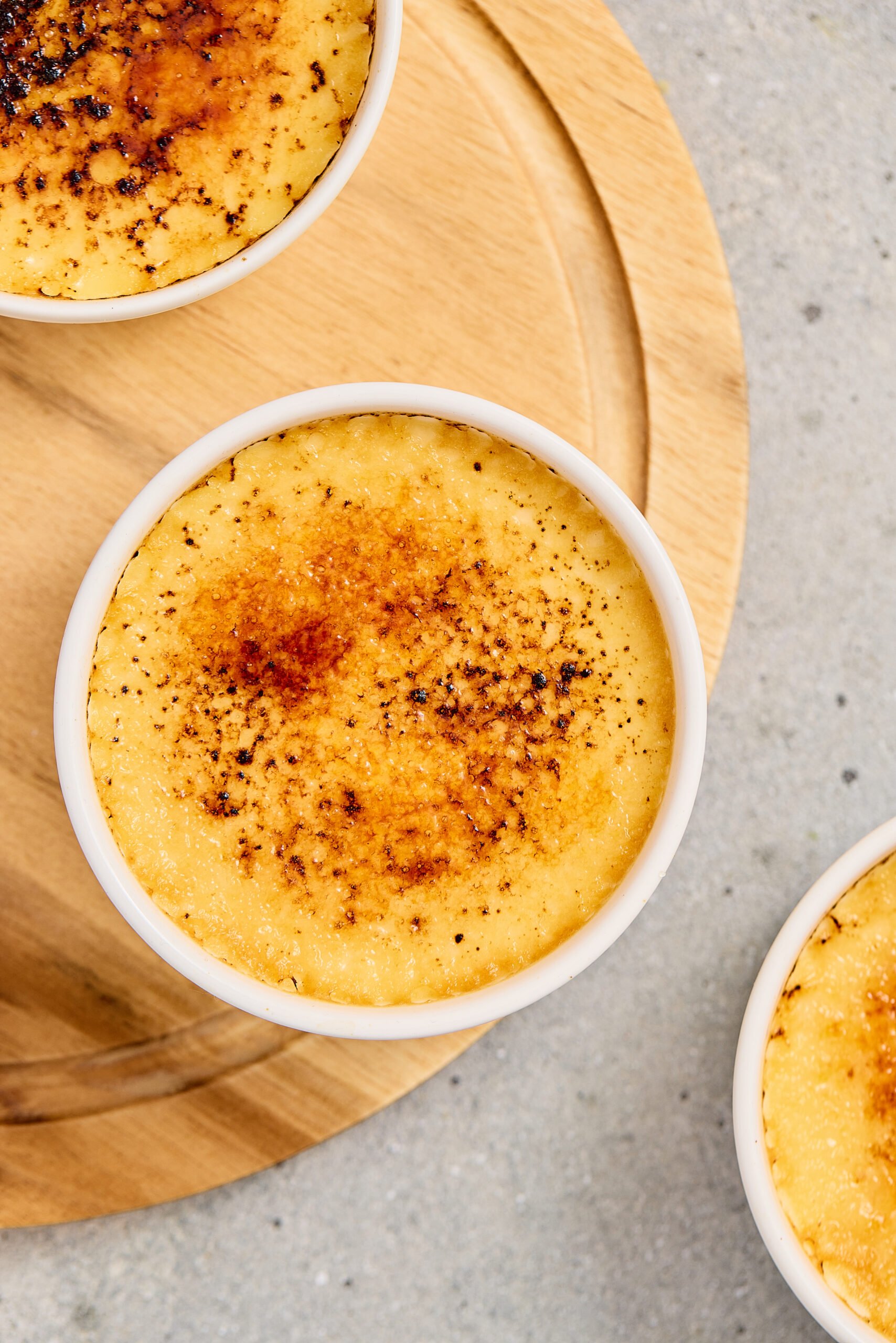 Classic cardamom crème brûlée with cracked sugar top.