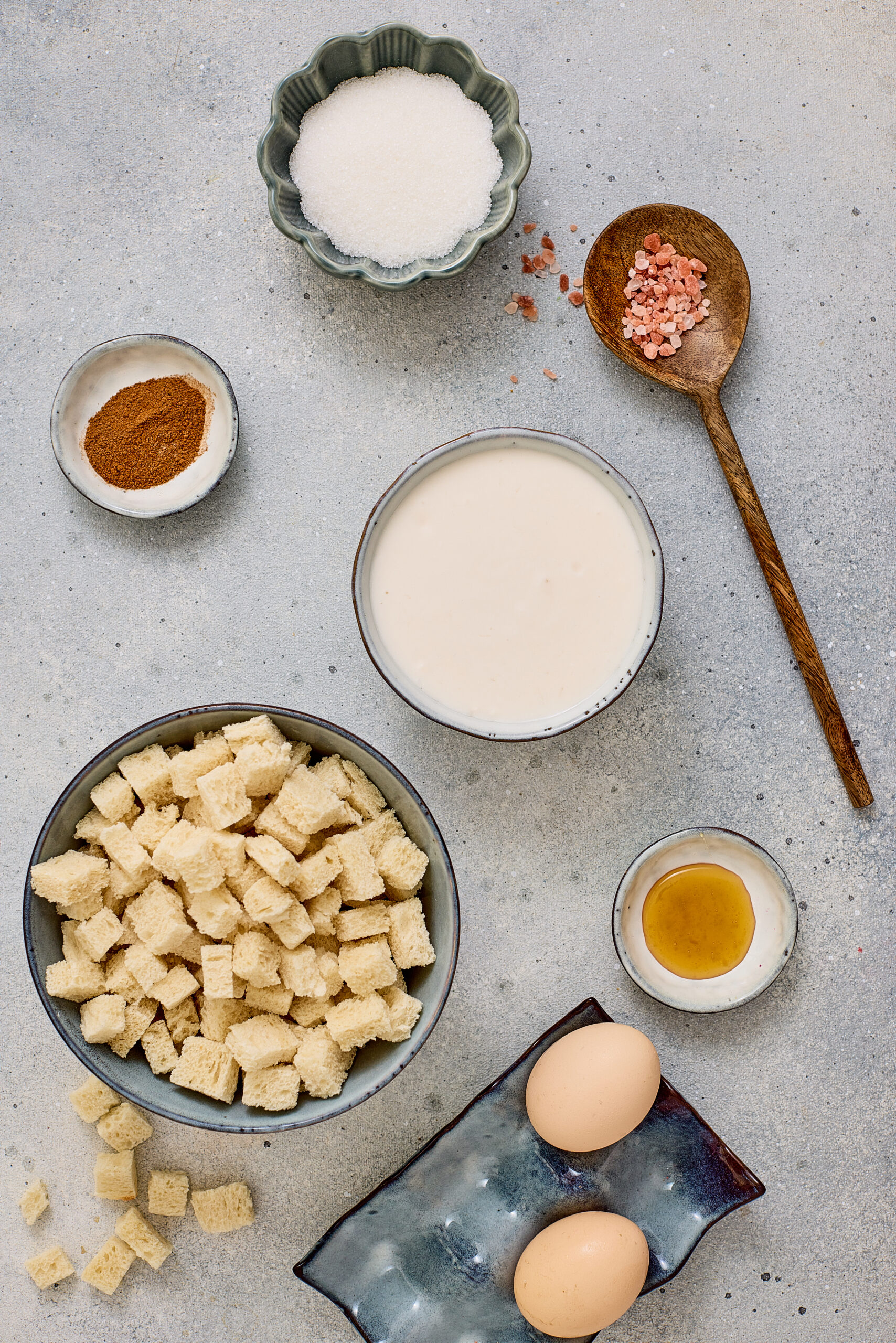 Ingredients for coconut chai bread pudding on a counter