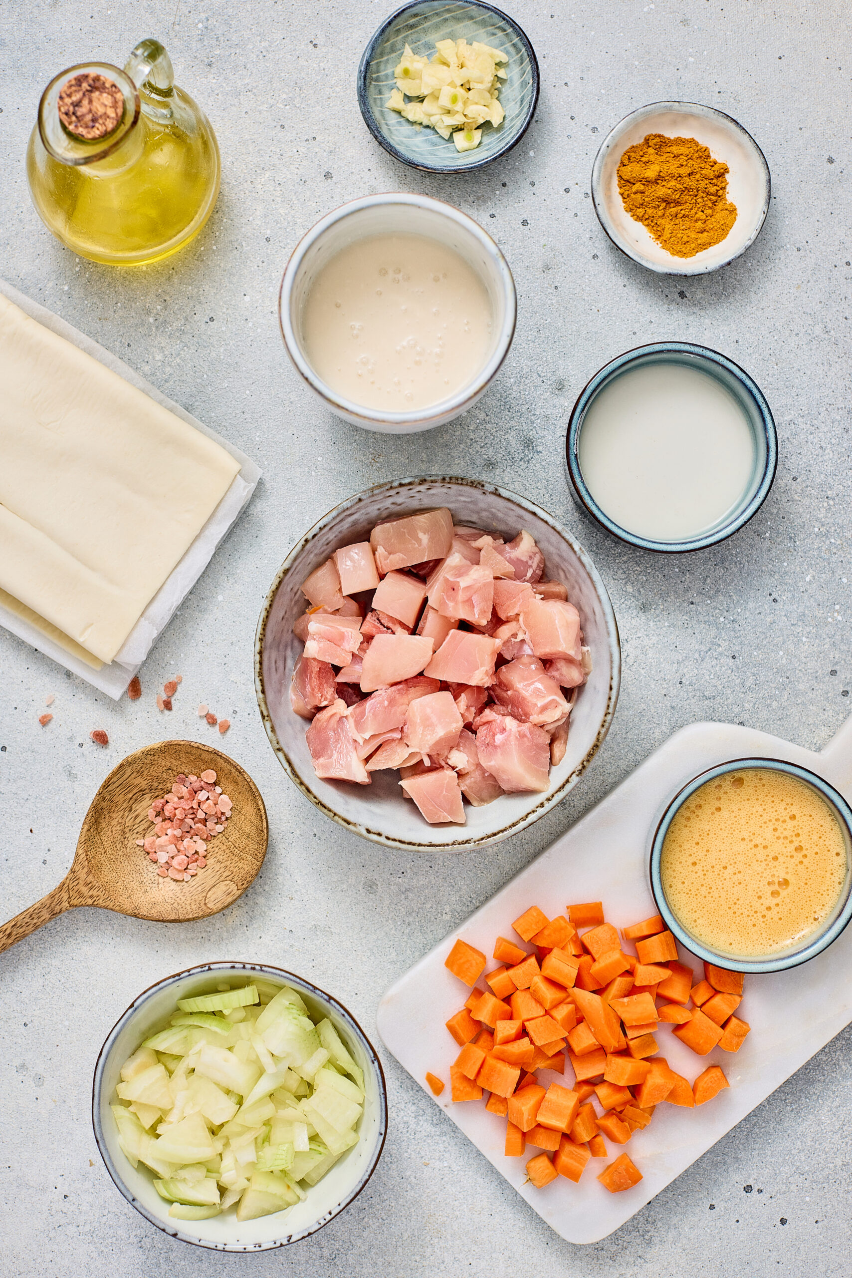 Ingredients of Curry pot pie arranged on a kitchen counter