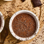 Masala Chocolate Mousse with a silky finish and light spice garnish.