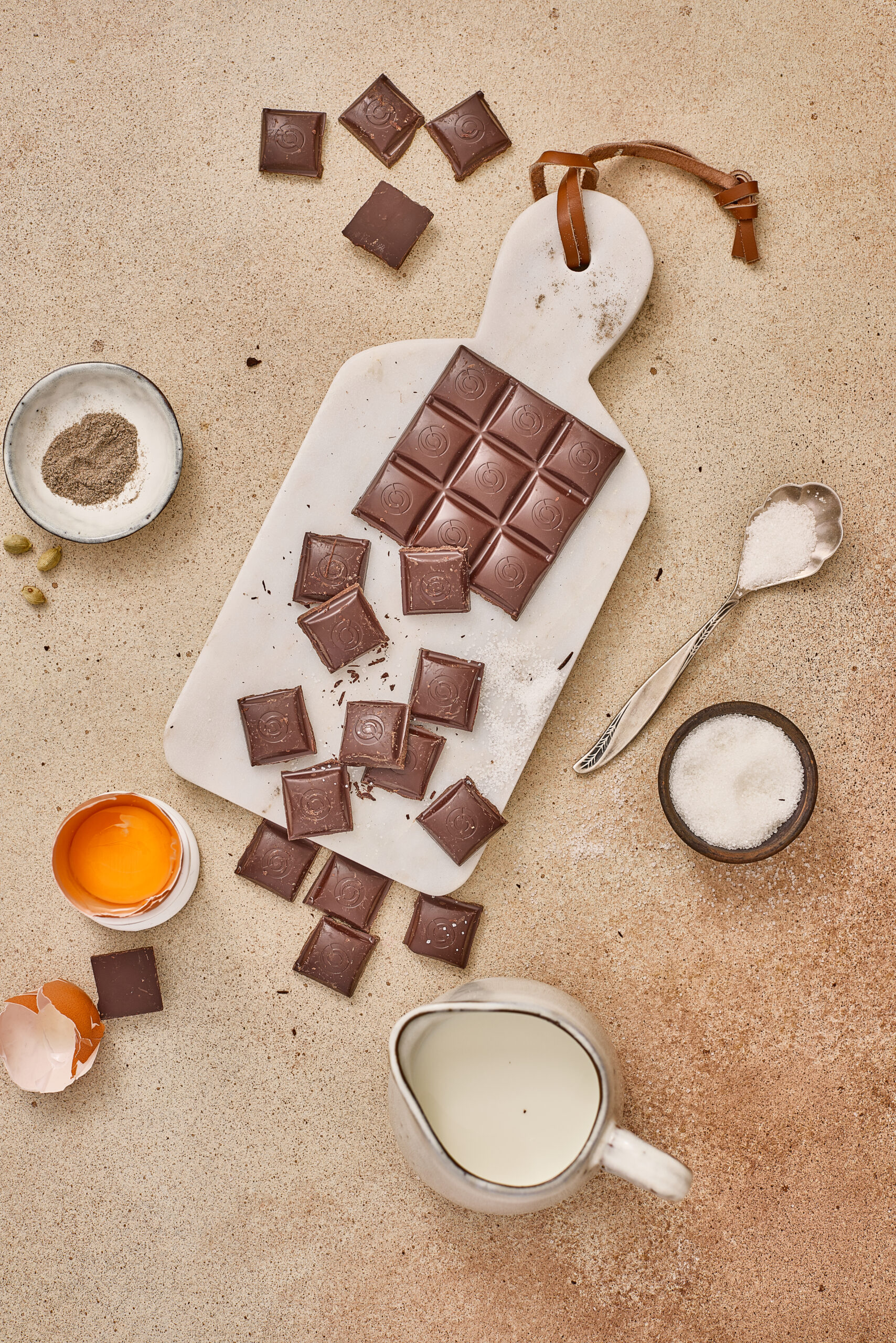 Masala Chocolate Mousse ingredients arranged on a kitchen counter.