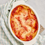 Palak paneer lasagna baked with creamy spinach and paneer layers