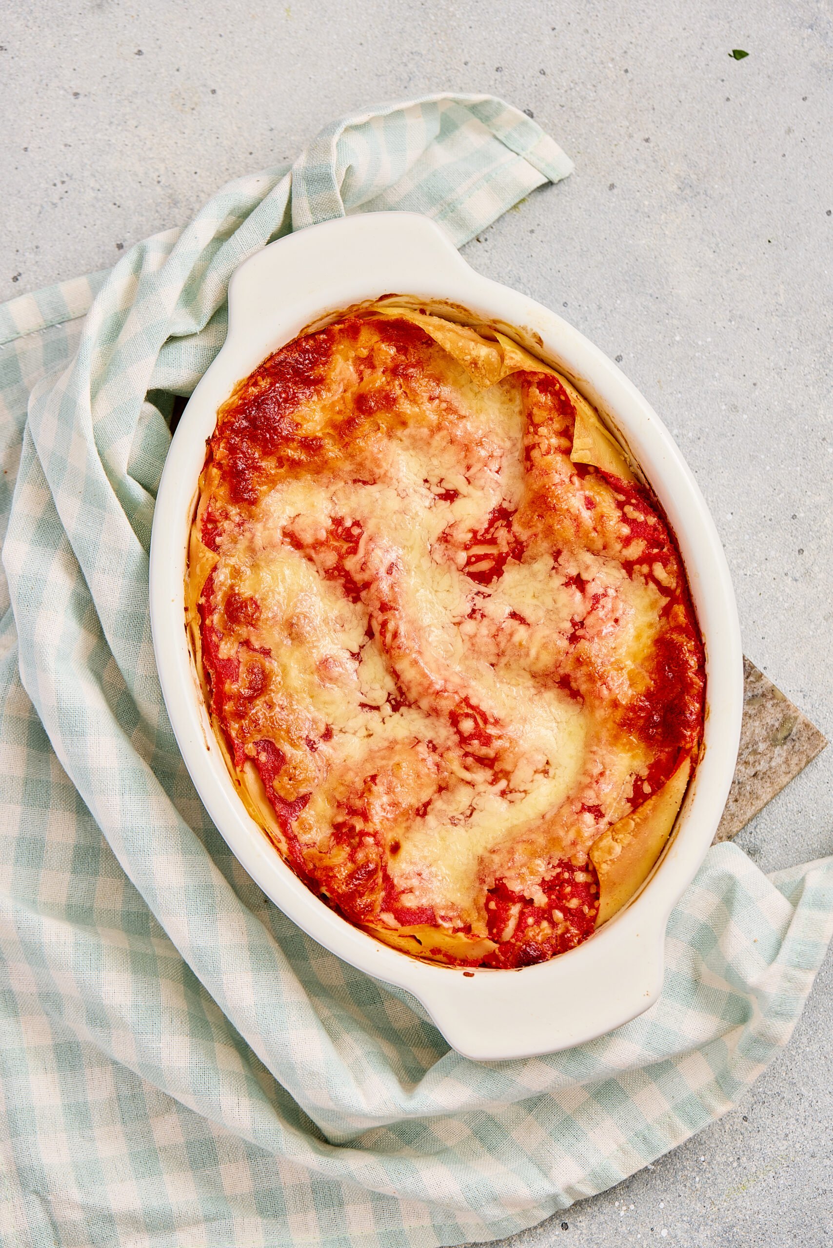 Palak paneer lasagna baked with creamy spinach and paneer layers