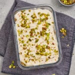 Pistachio rose tiramisu with creamy layers and chopped pistachios