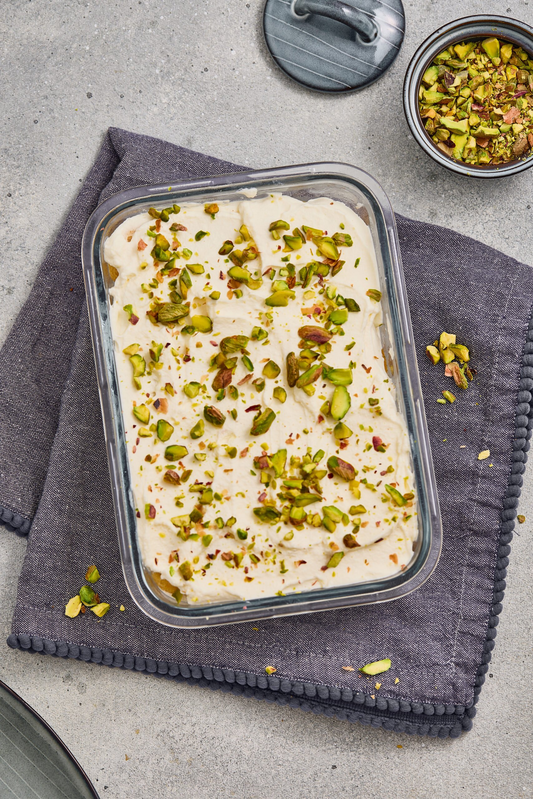 Pistachio rose tiramisu with creamy layers and chopped pistachios