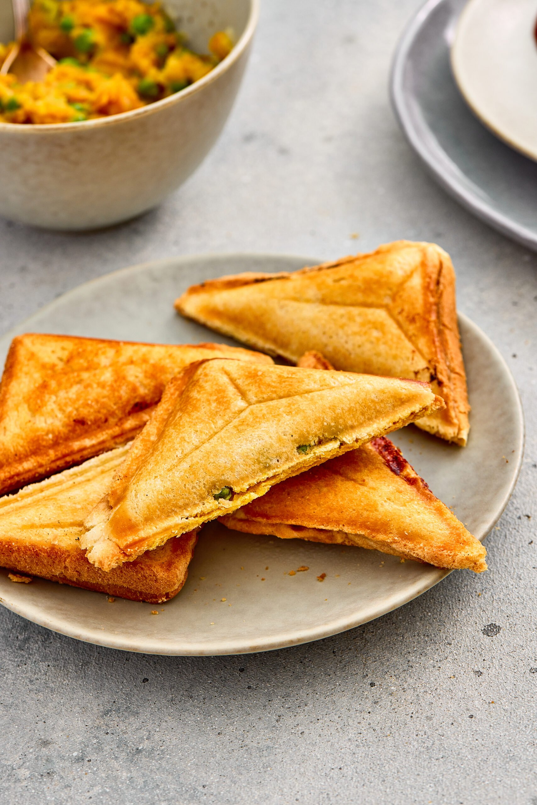 Golden toasted Samosa Toasties filled with spiced potato mixture.