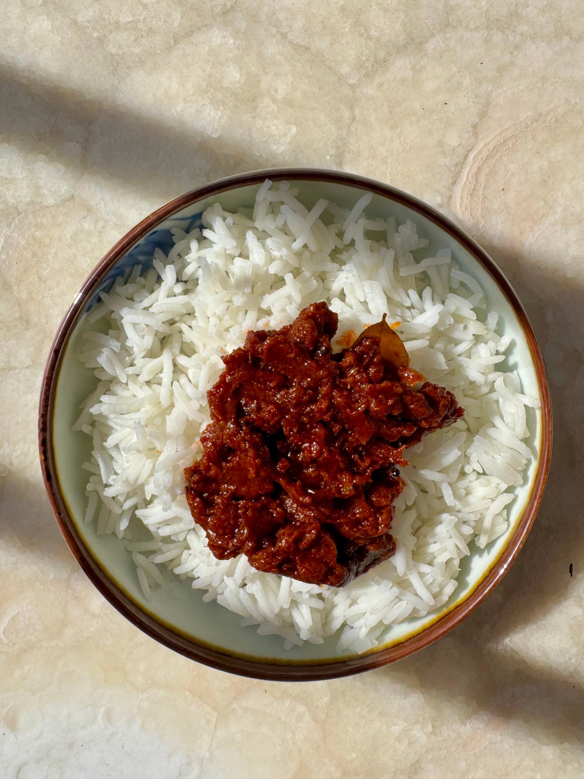 Tomato pickle served with plain white rice
