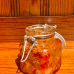 Usirikaya amla pickle in a glass jar