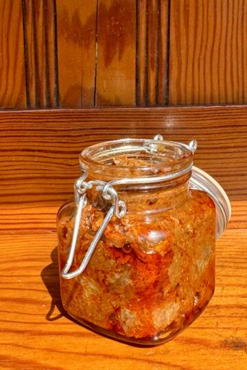 Usirikaya amla pickle in a glass jar