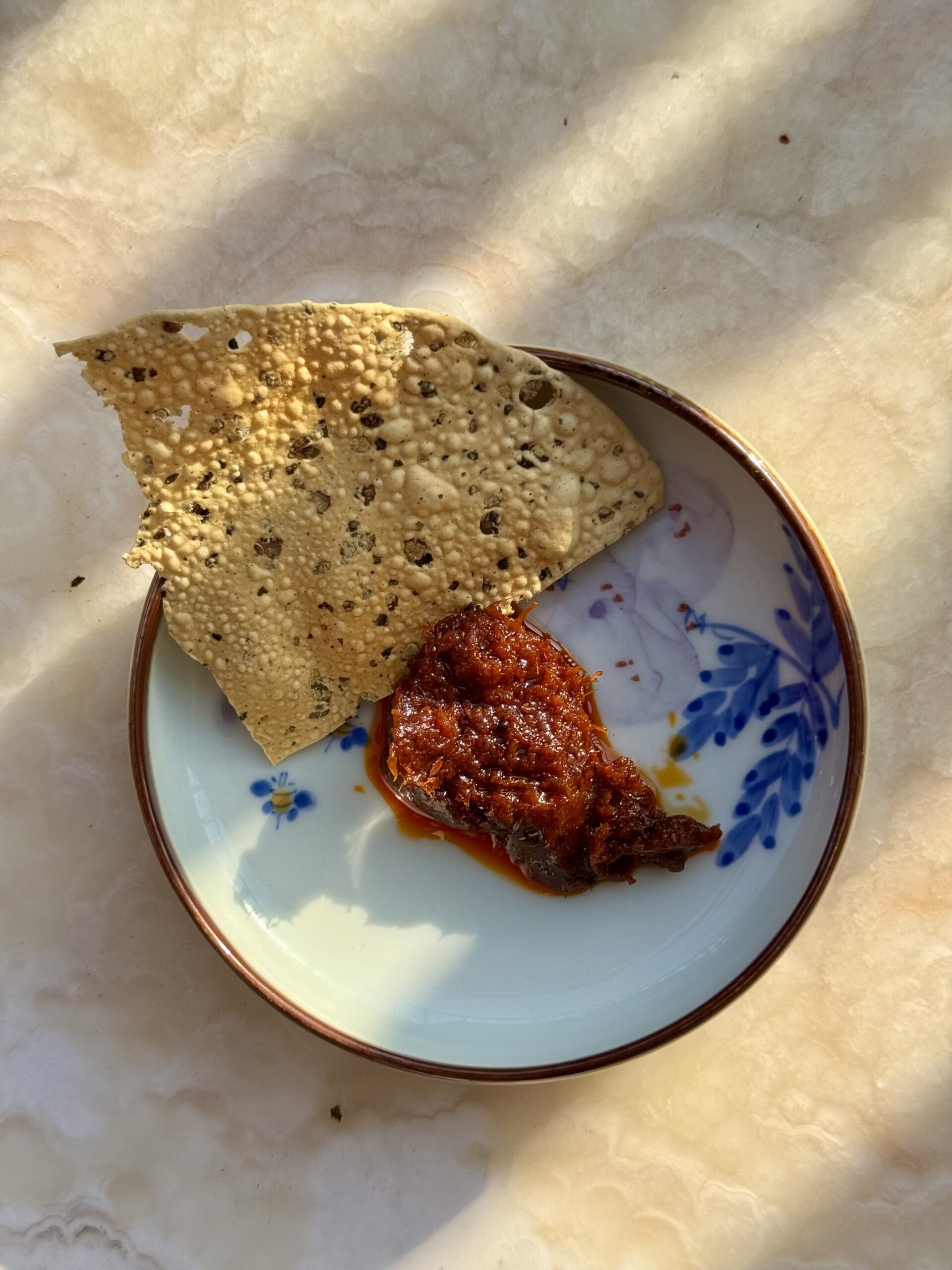Ginger pickle served with papad.