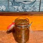 Gongura pickle store in glass jar.
