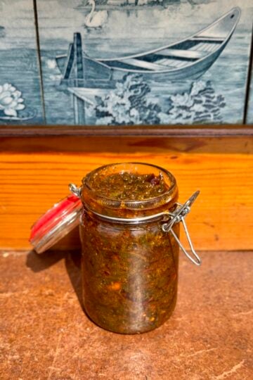 Gongura pickle store in glass jar.