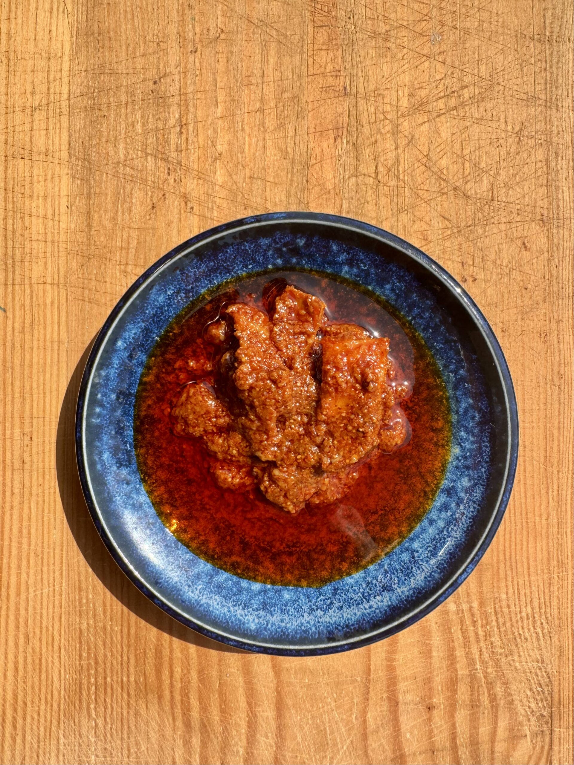 Mango ginger pickle ready to serve in a bowl.
