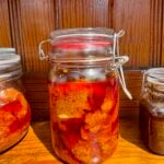 Mango ginger pickle store in glass jar.