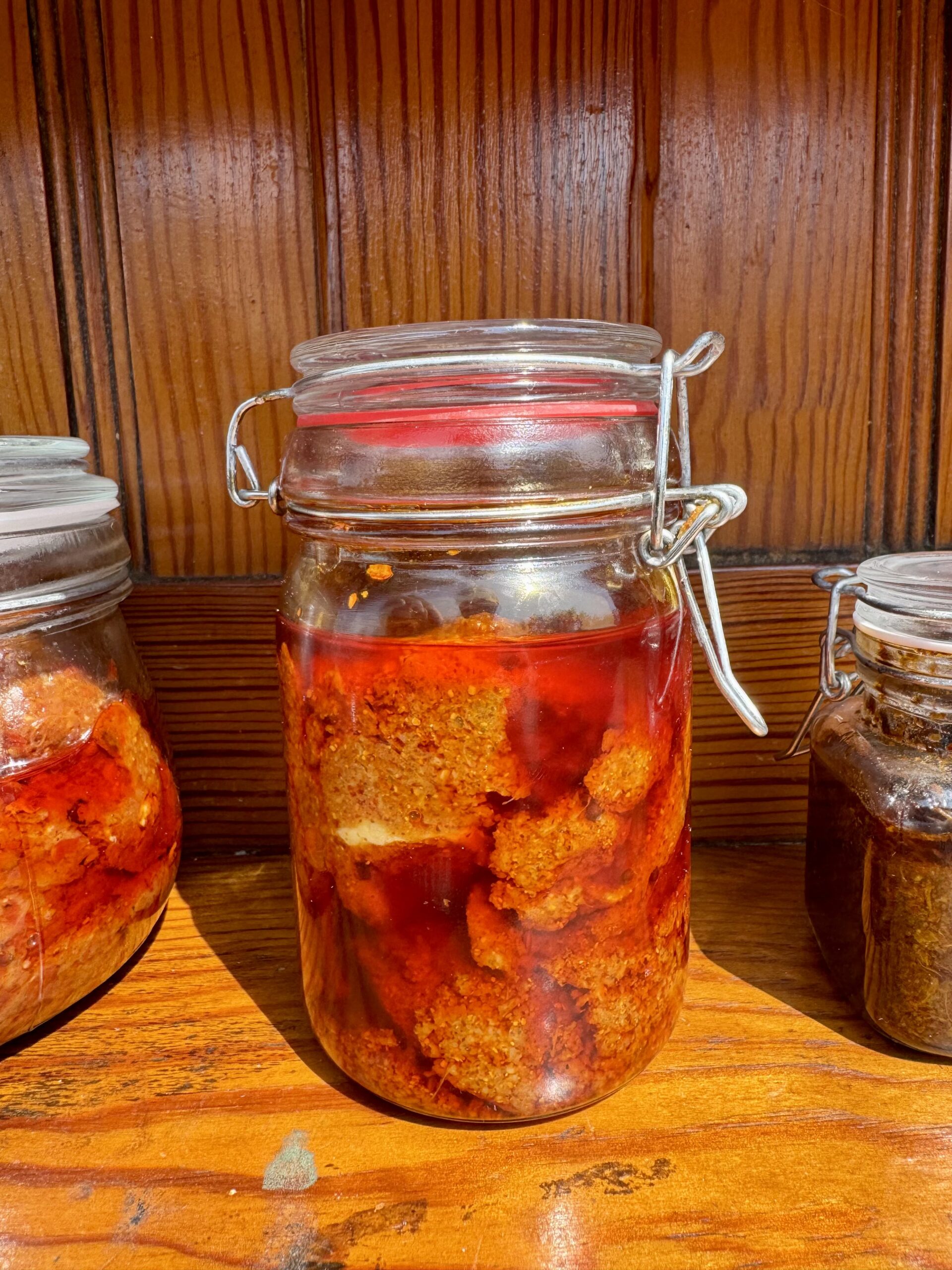 Mango ginger pickle store in glass jar.