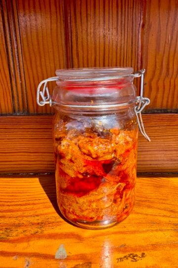 Mango thokku pickle store in glass jar.